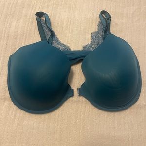 Beautiful teal with gold lettering on the band.